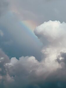 Storm cloud with rainbow