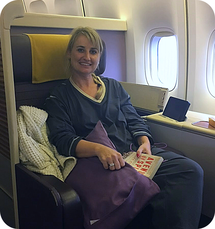 Women in first class flight accommodations